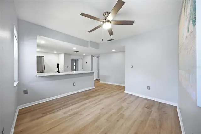 Living and dining area, 300 S Florida Ave #100K, Tarpon Springs