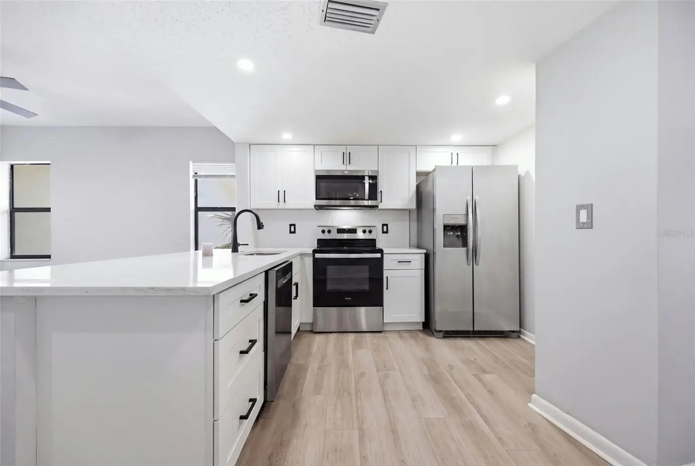 Remodeled kitchen with quartz counters, 300 S Florida Ave #100K, Tarpon Springs